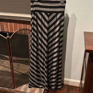Maxi skirt with wide waist band that can be rolled down to your waist or hips